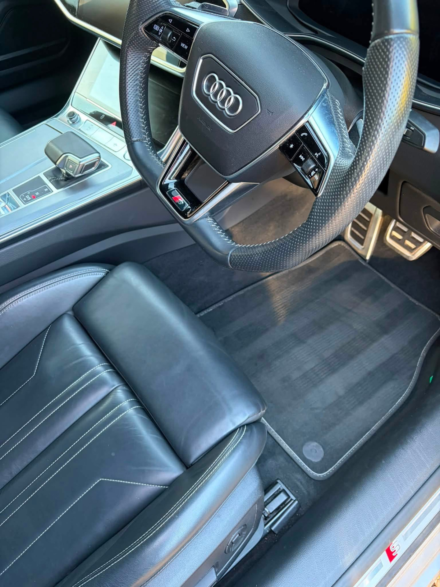 Audi interior driver's side cleaned and vacuumed